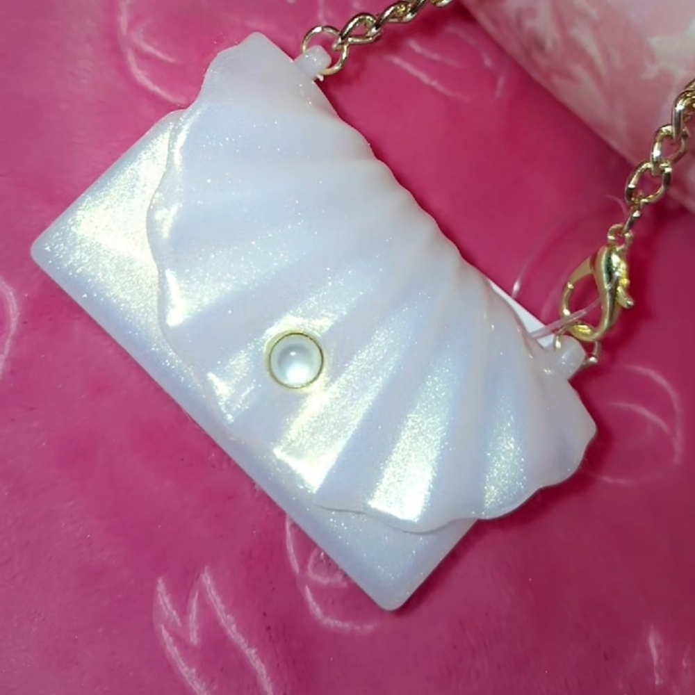 Elegant White Clutch with Gold Chain